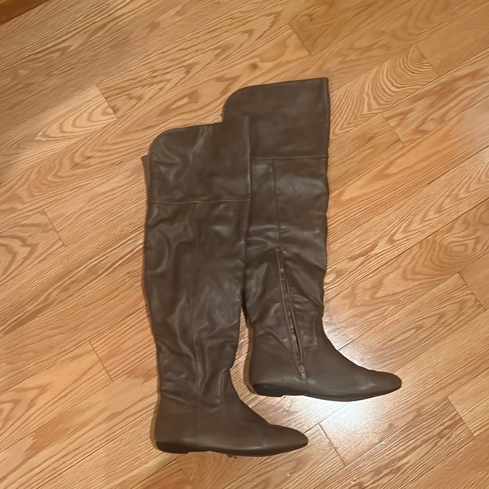 7 size pair of boots - above the knees